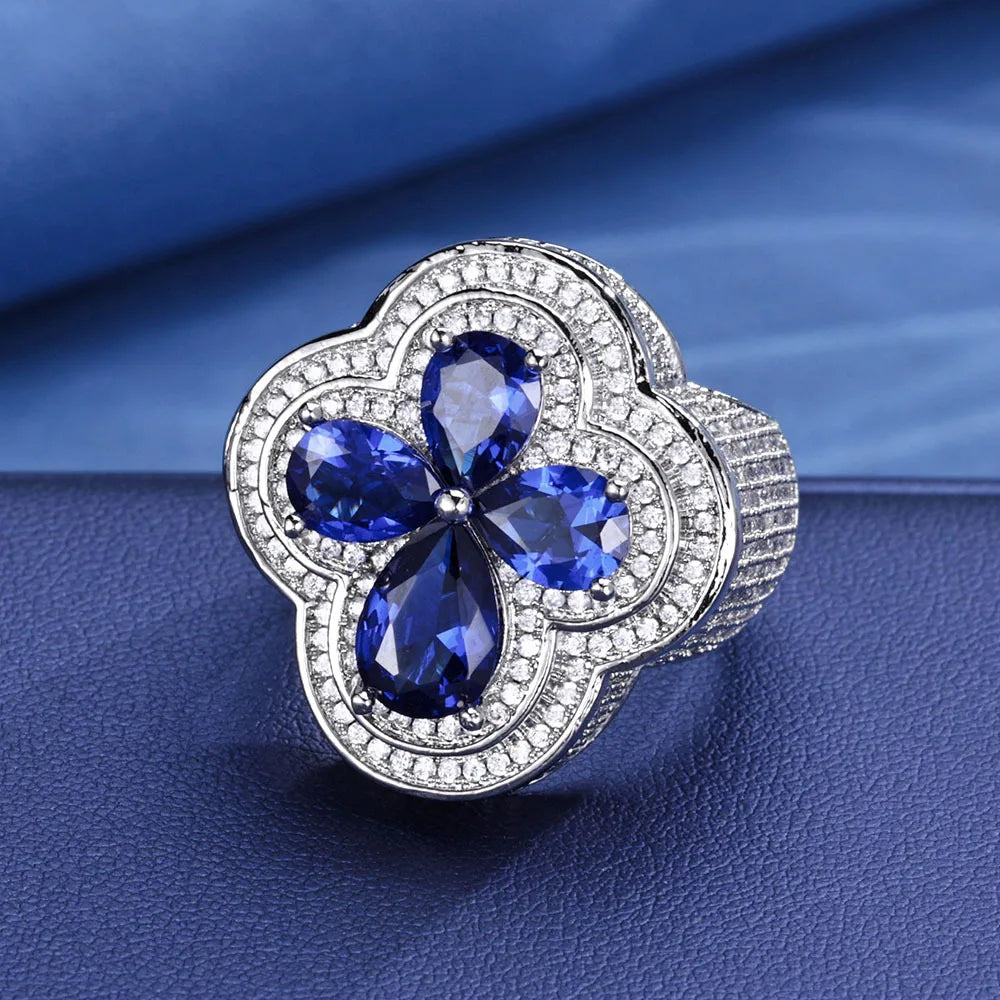 Blue Gemstone Flower Shape Rings White Gold Plated Hip Hop Style Iced Four Leaf Diamond Ring for Women Made Brass for Engagement