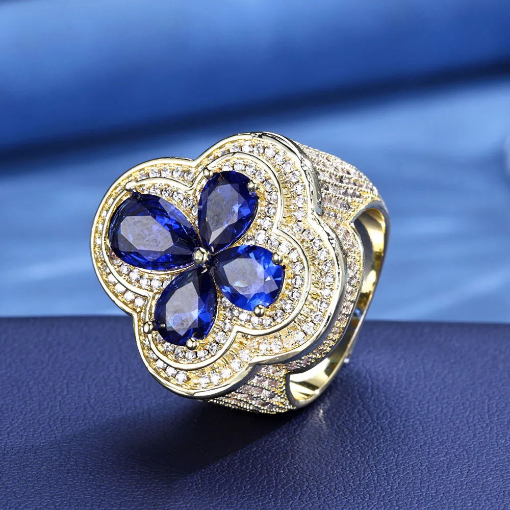 Blue Gemstone Flower Shape Rings White Gold Plated Hip Hop Style Iced Four Leaf Diamond Ring for Women Made Brass for Engagement
